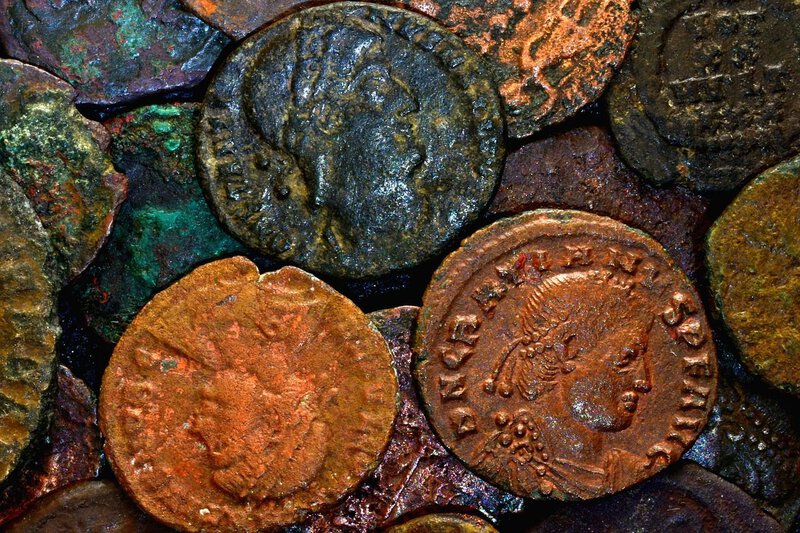 Ancient Roman copper and bronze coins directly illustrate the coins discussed in the article section about Pompeii&hellip;
