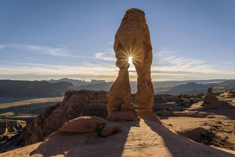 High-resolution image of Arches National Park near Moab captures the dramatic red sandstone terrain described in the…