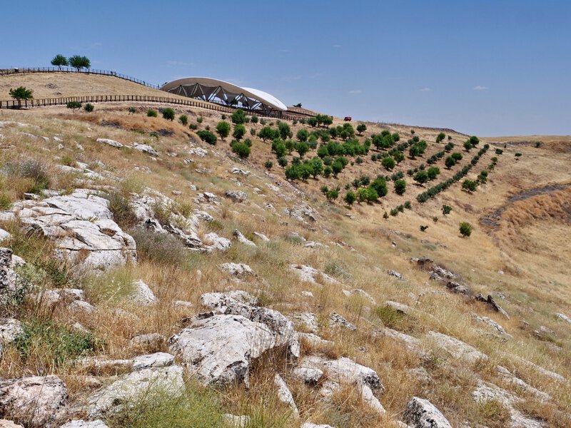 Shows the actual hill and archaeological site of G&ouml;bekli Tepe, directly matching the section