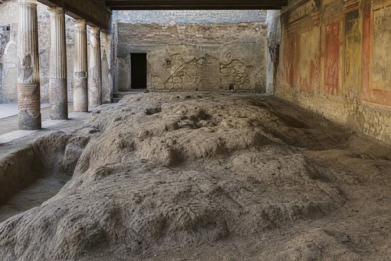 A view of the Herculaneum archaeological site, where the Villa of the Papyri remains deliberately unexcavated beneath&hellip;