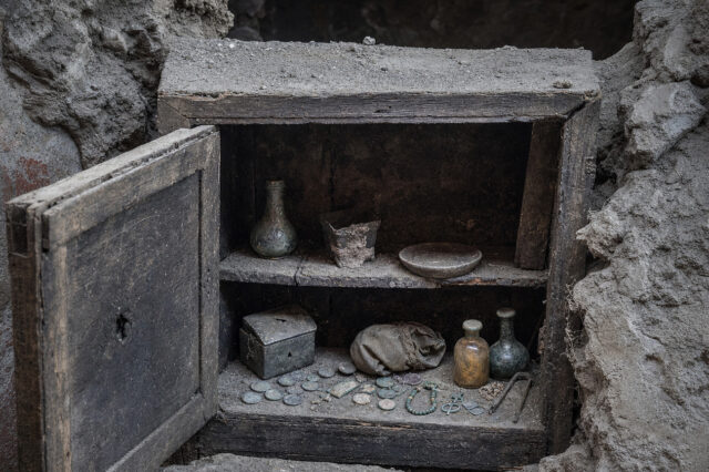 Pompeii Cupboard Sealed Since AD 79 Held Coins, Amulets, and Perfume