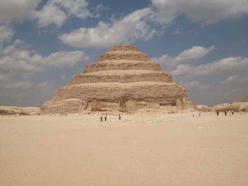 Image 4 shows the full Step Pyramid of Djoser at Saqqara from a wide-angle perspective, clearly depicting the stepped…