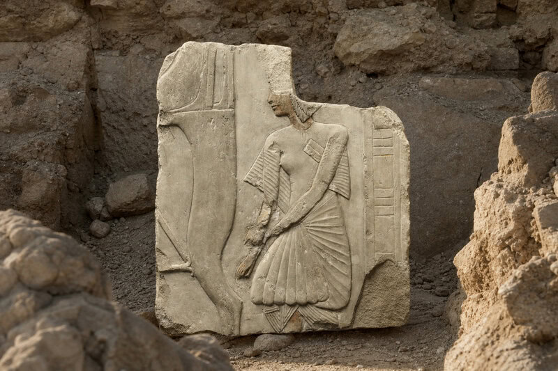 A carved stone figure fragment from Saqqara, a site occupied from 3100 BCE onward with vast sections still unexcavated to…